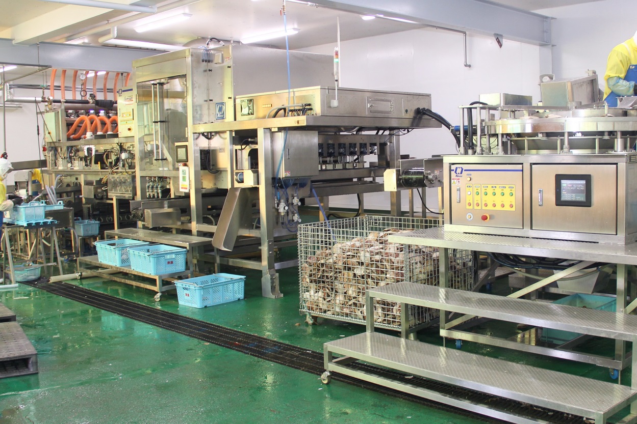 ホタテ貝柱自動生剥きロボット「オートシェラー」を中核とする水産加工システム