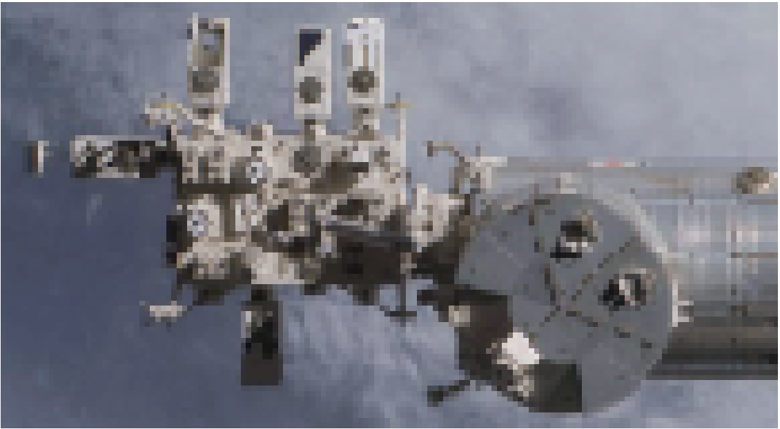 移設した実験装置と「きぼう」ロボットアーム